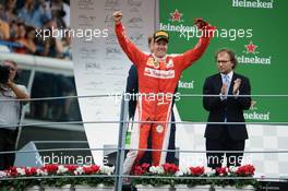 Sebastian Vettel (GER) Ferrari celebrates his third position on the podium. 04.09.2016. Formula 1 World Championship, Rd 14, Italian Grand Prix, Monza, Italy, Race Day.