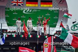 The podium (L to R): Lewis Hamilton (GBR) Mercedes AMG F1, second; Nico Rosberg (GER) Mercedes AMG F1, race winner; Eddie Jordan (IRE); Sebastian Vettel (GER) Ferrari, third. 04.09.2016. Formula 1 World Championship, Rd 14, Italian Grand Prix, Monza, Italy, Race Day.