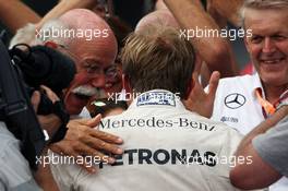 Race winner Nico Rosberg (GER) Mercedes AMG F1 celebrates with Dr. Dieter Zetsche (GER) Daimler AG CEO in parc ferme. 04.09.2016. Formula 1 World Championship, Rd 14, Italian Grand Prix, Monza, Italy, Race Day.