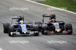 (L to R): Marcus Ericsson (SWE) Sauber C35 and Daniil Kvyat (RUS) Scuderia Toro Rosso STR11 battle for position. 04.09.2016. Formula 1 World Championship, Rd 14, Italian Grand Prix, Monza, Italy, Race Day.