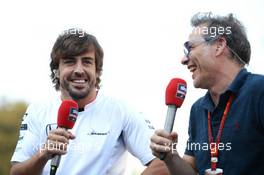 (L to R): Fernando Alonso (ESP) McLaren with Jacques Villeneuve (CDN). 03.09.2016. Formula 1 World Championship, Rd 14, Italian Grand Prix, Monza, Italy, Qualifying Day.
