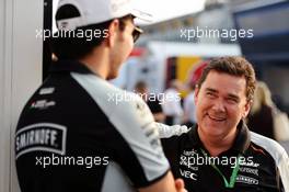 (L to R): Sergio Perez (MEX) Sahara Force India F1 with Steve Curnow (GBR) Sahara Force India F1 Team Commercial Director. 03.09.2016. Formula 1 World Championship, Rd 14, Italian Grand Prix, Monza, Italy, Qualifying Day.