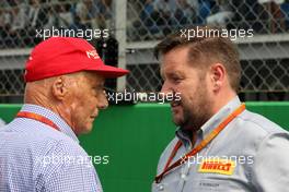 (L to R): Niki Lauda (AUT) Mercedes Non-Executive Chairman with Paul Hembery (GBR) Pirelli Motorsport Director. 04.09.2016. Formula 1 World Championship, Rd 14, Italian Grand Prix, Monza, Italy, Race Day.