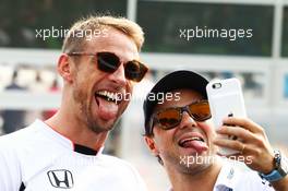 (L to R): Jenson Button (GBR) McLaren with Felipe Massa (BRA) Williams on the drivers parade. 04.09.2016. Formula 1 World Championship, Rd 14, Italian Grand Prix, Monza, Italy, Race Day.