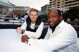 (L to R): Nico Hulkenberg (GER) Sahara Force India F1 and Dominique Siby, Felio Siby CEO at the Felio Siby yacht party. 28.05.2016. Formula 1 World Championship, Rd 6, Monaco Grand Prix, Monte Carlo, Monaco, Qualifying Day.