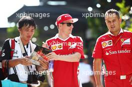 Kimi Raikkonen (FIN) Ferrari with Diego Ioverno (ITA) Ferrari Operations Director. 30.09.2016. Formula 1 World Championship, Rd 16, Malaysian Grand Prix, Sepang, Malaysia, Friday.