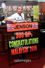 Jenson Button (GBR), McLaren Honda celebrates 300GP 30.09.2016. Formula 1 World Championship, Rd 16, Malaysian Grand Prix, Sepang, Malaysia, Friday.