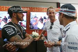 Jenson Button (GBR), McLaren Honda celebrates 300GP, Lewis Hamilton (GBR), Mercedes AMG F1 Team and Felipe Massa (BRA), Williams F1 Team  30.09.2016. Formula 1 World Championship, Rd 16, Malaysian Grand Prix, Sepang, Malaysia, Friday.