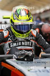 Sergio Perez (MEX) Sahara Force India F1 VJM09 on the grid. 02.10.2016. Formula 1 World Championship, Rd 16, Malaysian Grand Prix, Sepang, Malaysia, Sunday.