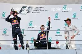 The podium (L to R): Max Verstappen (NLD) Red Bull Racing, second; Daniel Ricciardo (AUS) Red Bull Racing, race winner; Nico Rosberg (GER) Mercedes AMG F1, third. 02.10.2016. Formula 1 World Championship, Rd 16, Malaysian Grand Prix, Sepang, Malaysia, Sunday.