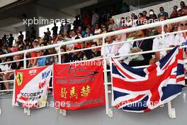Fans in the grandstand. 02.10.2016. Formula 1 World Championship, Rd 16, Malaysian Grand Prix, Sepang, Malaysia, Sunday.