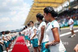Grid girls on the drivers parade. 02.10.2016. Formula 1 World Championship, Rd 16, Malaysian Grand Prix, Sepang, Malaysia, Sunday.