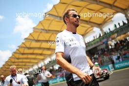 Jenson Button (GBR) McLaren on the drivers parade. 02.10.2016. Formula 1 World Championship, Rd 16, Malaysian Grand Prix, Sepang, Malaysia, Sunday.