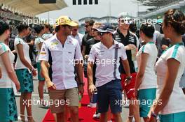 (L to R): Felipe Nasr (BRA) Sauber F1 Team with Felipe Massa (BRA) Williams on the drivers parade. 02.10.2016. Formula 1 World Championship, Rd 16, Malaysian Grand Prix, Sepang, Malaysia, Sunday.