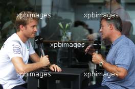 (L to R): Nico Rosberg (GER) Mercedes AMG F1 with Jean Alesi (FRA) Canal+ Presenter. 29.09.2016. Formula 1 World Championship, Rd 16, Malaysian Grand Prix, Sepang, Malaysia, Thursday.