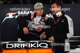 Nico Hulkenberg (GER) Sahara Force India F1 with Bradley Joyce (GBR) Sahara Force India F1 Race Engineer. 01.05.2016. Formula 1 World Championship, Rd 4, Russian Grand Prix, Sochi Autodrom, Sochi, Russia, Race Day.