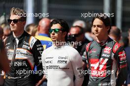 (L to R): Nico Hulkenberg (GER) Sahara Force India F1 and Sergio Perez (MEX) Sahara Force India F1 as the grid observes the national anthem. 01.05.2016. Formula 1 World Championship, Rd 4, Russian Grand Prix, Sochi Autodrom, Sochi, Russia, Race Day.