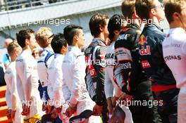 The drivers on the grid oserve the National Anthem. 01.05.2016. Formula 1 World Championship, Rd 4, Russian Grand Prix, Sochi Autodrom, Sochi, Russia, Race Day.