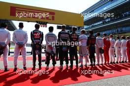 The drivers on the grid observe the national anthem. 01.05.2016. Formula 1 World Championship, Rd 4, Russian Grand Prix, Sochi Autodrom, Sochi, Russia, Race Day.