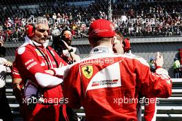 (L to R): Maurizio Arrivabene (ITA) Ferrari Team Principal with Kimi Raikkonen (FIN) Ferrari and Dave Greenwood (GBR) Ferrari Race Engineer on the grid. 01.05.2016. Formula 1 World Championship, Rd 4, Russian Grand Prix, Sochi Autodrom, Sochi, Russia, Race Day.