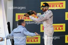 Lewis Hamilton (GBR) Mercedes AMG F1 celebrates on the podium. 01.05.2016. Formula 1 World Championship, Rd 4, Russian Grand Prix, Sochi Autodrom, Sochi, Russia, Race Day.
