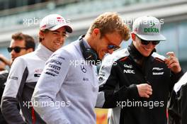 (L to R): Nico Rosberg (GER) Mercedes AMG F1 with Nico Hulkenberg (GER) Sahara Force India F1 on the drivers parade. 01.05.2016. Formula 1 World Championship, Rd 4, Russian Grand Prix, Sochi Autodrom, Sochi, Russia, Race Day.