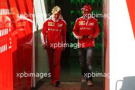 Sebastian Vettel (GER) Ferrari with Britta Roeske (AUT) Ferrari Press Officer. 28.04.2016. Formula 1 World Championship, Rd 4, Russian Grand Prix, Sochi Autodrom, Sochi, Russia, Preparation Day.