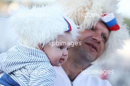 A fan with his baby son. 28.04.2016. Formula 1 World Championship, Rd 4, Russian Grand Prix, Sochi Autodrom, Sochi, Russia, Preparation Day.