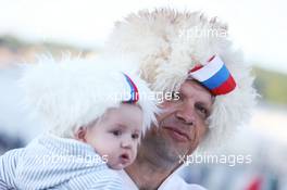 A fan with his baby son. 28.04.2016. Formula 1 World Championship, Rd 4, Russian Grand Prix, Sochi Autodrom, Sochi, Russia, Preparation Day.