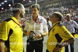 (L to R): Cyril Abiteboul (FRA) Renault Sport F1 Managing Director with Toto Wolff (GER) Mercedes AMG F1 Shareholder and Executive Director and Frederic Vasseur (FRA) Renault Sport F1 Team Racing Director on the grid. 18.09.2016. Formula 1 World Championship, Rd 15, Singapore Grand Prix, Marina Bay Street Circuit, Singapore, Race Day.