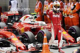 Sebastian Vettel (GER) Ferrari SF16-H in parc ferme. 18.09.2016. Formula 1 World Championship, Rd 15, Singapore Grand Prix, Marina Bay Street Circuit, Singapore, Race Day.