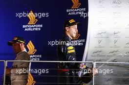 Daniel Ricciardo (AUS) Red Bull Racing celebrates his second position on the podium with race winner Nico Rosberg (GER) Mercedes AMG F1. 18.09.2016. Formula 1 World Championship, Rd 15, Singapore Grand Prix, Marina Bay Street Circuit, Singapore, Race Day.
