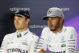 (L to R): Nico Rosberg (GER) Mercedes AMG F1 and team mate Lewis Hamilton (GBR) Mercedes AMG F1 in the FIA Press Conference. 17.09.2016. Formula 1 World Championship, Rd 15, Singapore Grand Prix, Marina Bay Street Circuit, Singapore, Qualifying Day.