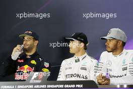 Qualifying top three in  the FIA Press Conference (L to R): Daniel Ricciardo (AUS) Red Bull Racing, second; Nico Rosberg (GER) Mercedes AMG F1, pole position; Lewis Hamilton (GBR) Mercedes AMG F1, third. 17.09.2016. Formula 1 World Championship, Rd 15, Singapore Grand Prix, Marina Bay Street Circuit, Singapore, Qualifying Day.