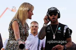 Lewis Hamilton (GBR) Mercedes AMG F1 with Rachel Brookes (GBR) Sky Sports F1 Reporter on the drivers parade. 18.09.2016. Formula 1 World Championship, Rd 15, Singapore Grand Prix, Marina Bay Street Circuit, Singapore, Race Day.