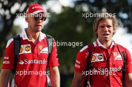 Sebastian Vettel (GER) Ferrari with Antti Kontsas (FIN) Personal Trainer. 15.09.2016. Formula 1 World Championship, Rd 15, Singapore Grand Prix, Marina Bay Street Circuit, Singapore, Preparation Day.