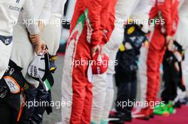 Sergio Perez (MEX) Sahara Force India F1 as the grid observes the national anthem. 27.11.2016. Formula 1 World Championship, Rd 21, Abu Dhabi Grand Prix, Yas Marina Circuit, Abu Dhabi, Race Day.