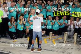 Lewis Hamilton (GBR) Mercedes AMG F1 celebrates with Thomas Weber (GER) Member of the Board of Management of Daimler AG and the team. 27.11.2016. Formula 1 World Championship, Rd 21, Abu Dhabi Grand Prix, Yas Marina Circuit, Abu Dhabi, Race Day.