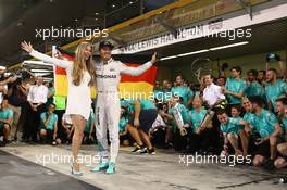 Nico Rosberg (GER) Mercedes AMG Petronas F1 W07 celebrates winning the world championship with  Vivian Rosberg (GER) ,  his friends and team. 27.11.2016. Formula 1 World Championship, Rd 21, Abu Dhabi Grand Prix, Yas Marina Circuit, Abu Dhabi, Race Day.