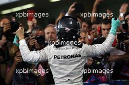 Nico Rosberg (GER) Mercedes AMG F1 celebrates his World Championship in parc ferme. 27.11.2016. Formula 1 World Championship, Rd 21, Abu Dhabi Grand Prix, Yas Marina Circuit, Abu Dhabi, Race Day.