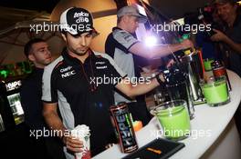 (L to R): Sergio Perez (MEX) Sahara Force India F1 and Nico Hulkenberg (GER) Sahara Force India F1 at a Hype Energy Drink event. 24.11.2016. Formula 1 World Championship, Rd 21, Abu Dhabi Grand Prix, Yas Marina Circuit, Abu Dhabi, Preparation Day.