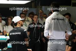 (L to R): Lewis Hamilton (GBR) Mercedes AMG F1 and Toto Wolff (GER) Mercedes AMG F1 Shareholder and Executive Director at a team meeting. 24.11.2016. Formula 1 World Championship, Rd 21, Abu Dhabi Grand Prix, Yas Marina Circuit, Abu Dhabi, Preparation Day.
