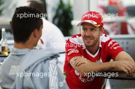 (L to R): Pascal Wehrlein (GER) Manor Racing with Sebastian Vettel (GER) Ferrari. 21.10.2016. Formula 1 World Championship, Rd 18, United States Grand Prix, Austin, Texas, USA, Practice Day.