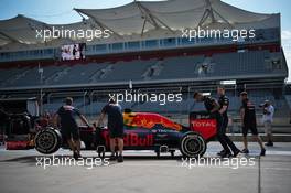 Red Bull Racing RB12 pushed by mechanics to scrutineering. 20.10.2016. Formula 1 World Championship, Rd 18, United States Grand Prix, Austin, Texas, USA, Preparation Day.