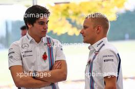(L to R): Lance Stroll (CDN) Williams with Valtteri Bottas (FIN) Williams. 03.11.2016. Williams Driver Line-Up Announcement. Williams F1 Headquarters, Grove, England.