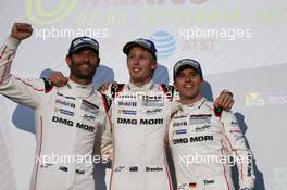 (L to R): Race winners Mark Webber (AUS) / Brendon Hartley (NZL) and Timo Bernhard (GER) #01 Porsche Team Porsche 919 Hybrid celebrate on the podium.  03.09.2016. FIA World Endurance Championship, Rd 5, 6 Hours of Mexico, Mexico City, Mexico.