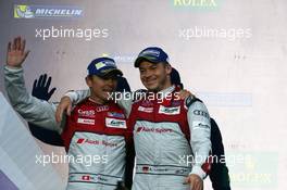 Second placed Marcel Fassler (SUI) and Andre Lotterer (GER) #07 Audi Sport Team Joest Audi R18 on the podium. 03.09.2016. FIA World Endurance Championship, Rd 5, 6 Hours of Mexico, Mexico City, Mexico.