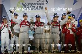 (L to R): Race winners  Oliver Jarvis (GBR) / Loic Duval (FRA) / Lucas di Grassi (BRA) #08 Audi Sport Team Joest Audi R18, celebrate on the podium. 19.11.2016. FIA World Endurance Championship, Round 9, Six Hours of Bahrain, Sakhir, Bahrain, Saturday