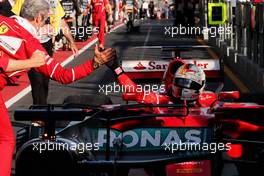 Race winner Sebastian Vettel (GER) Ferrari SF70H celebrates with Maurizio Arrivabene (ITA) Ferrari Team Principal in parc ferme. 26.03.2017. Formula 1 World Championship, Rd 1, Australian Grand Prix, Albert Park, Melbourne, Australia, Race Day.