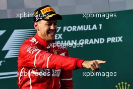 Race winner Sebastian Vettel (GER) Ferrari celebrates on the podium. 26.03.2017. Formula 1 World Championship, Rd 1, Australian Grand Prix, Albert Park, Melbourne, Australia, Race Day.